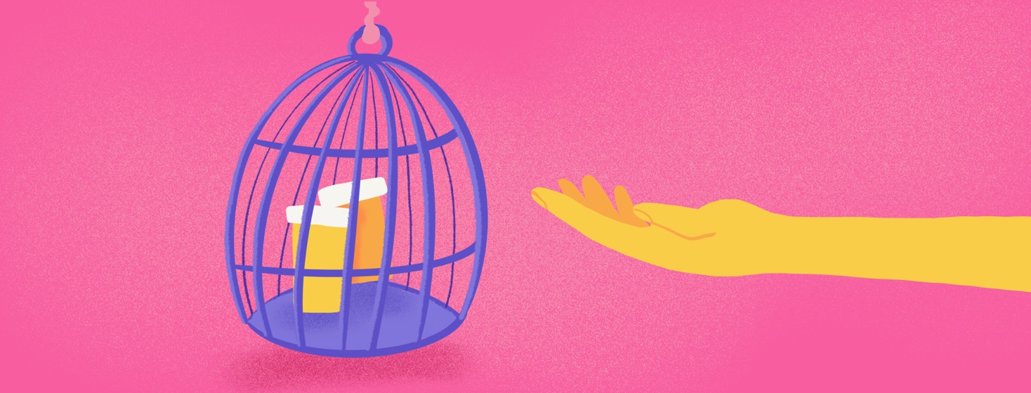 Hand reaching out toward medication which is locked away in a cage