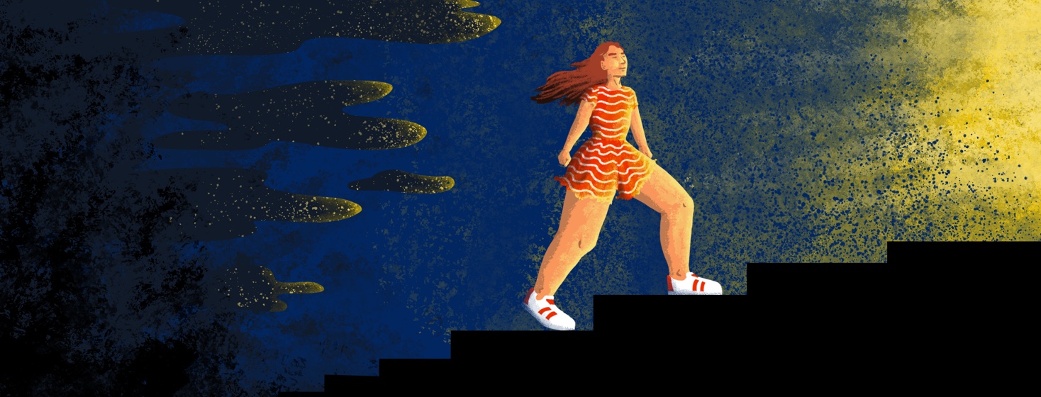A woman walks determinedly up a flight of stairs out of darkness and into light.