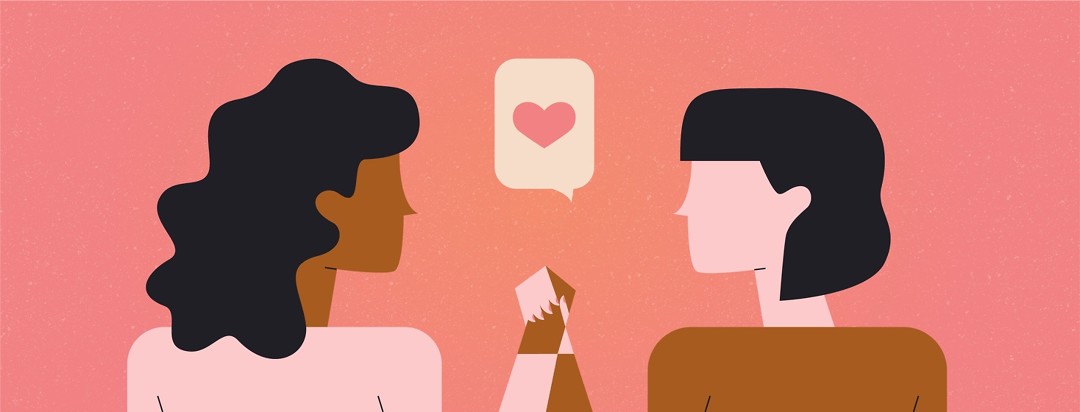 Two people facing each other clasp hands while an iMessage speech bubble containing a heart emoji appears between them