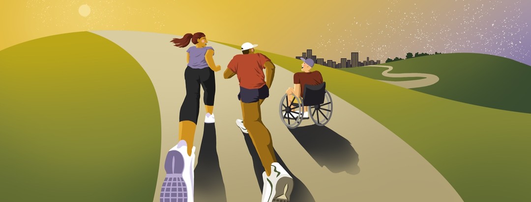 Two people are running up a hill, smiling at a person in a wheelchair to the right of them who is wheeling alongside them. In the distance is a city skyline.