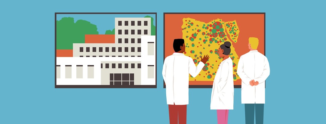 Three doctors stand around examining large screens showing a hospital, a map of Egypt with red and green dots all over it.