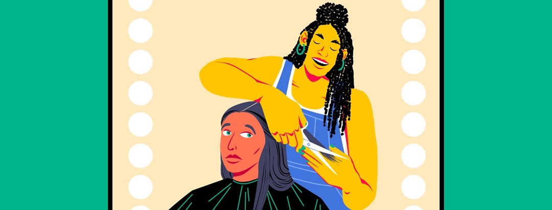 A hairdresser is cutting a woman's hair. The woman is looking nervously at the hairdresser's scissors.