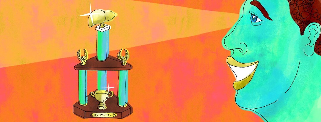 someone diagnosed with hepatitis c looking at a trophy topped with a golden liver