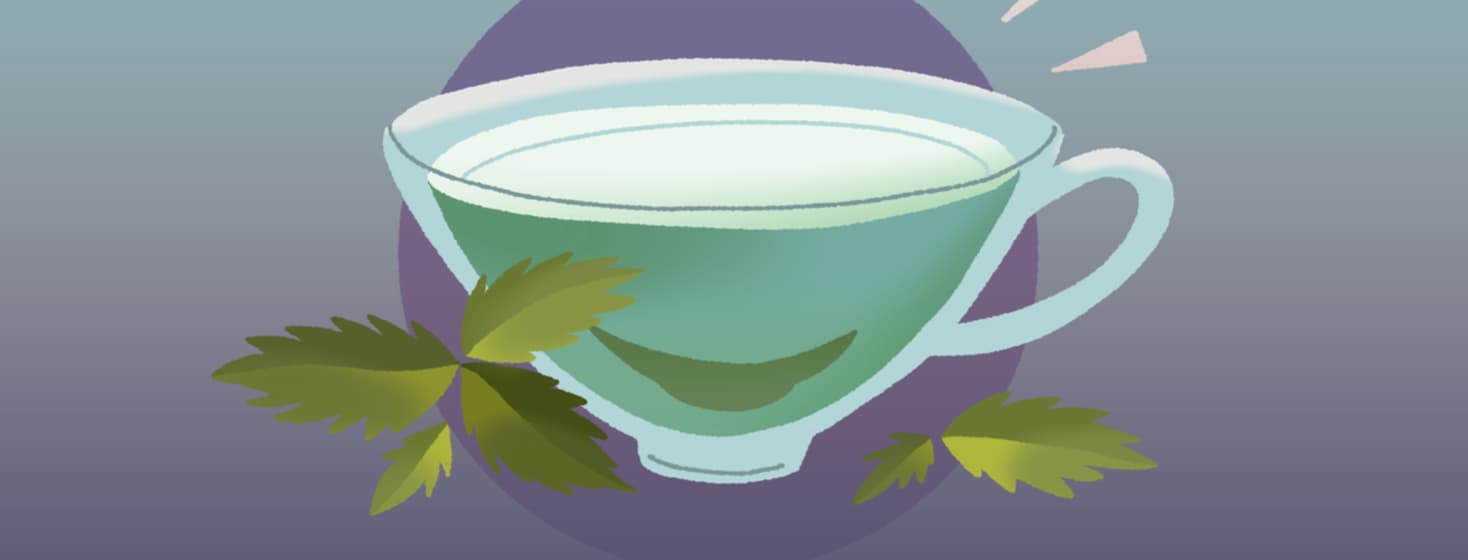 a cup of green tea on a purple background