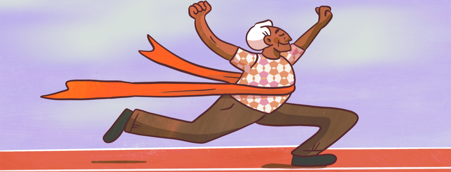 A man crossing the finish line of a race